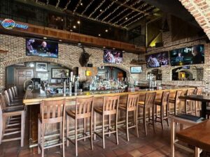 Sports bar with four flat screen TVs at Nick's in OCMD